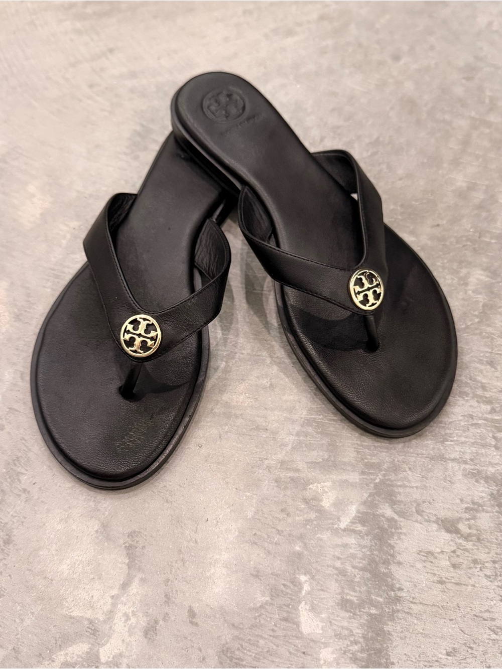 Tory Burch Black Leather Logo Thong Sandals with Gold Emblem